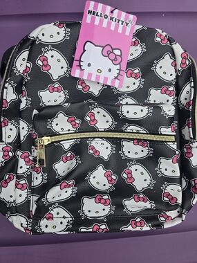 Hello Kitty Black Backpack with Pink Accents and Gold Zipper